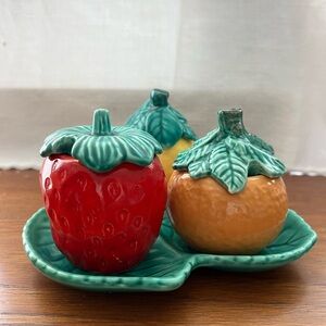 Vintage Ceramic jam jars on a leaf plate.